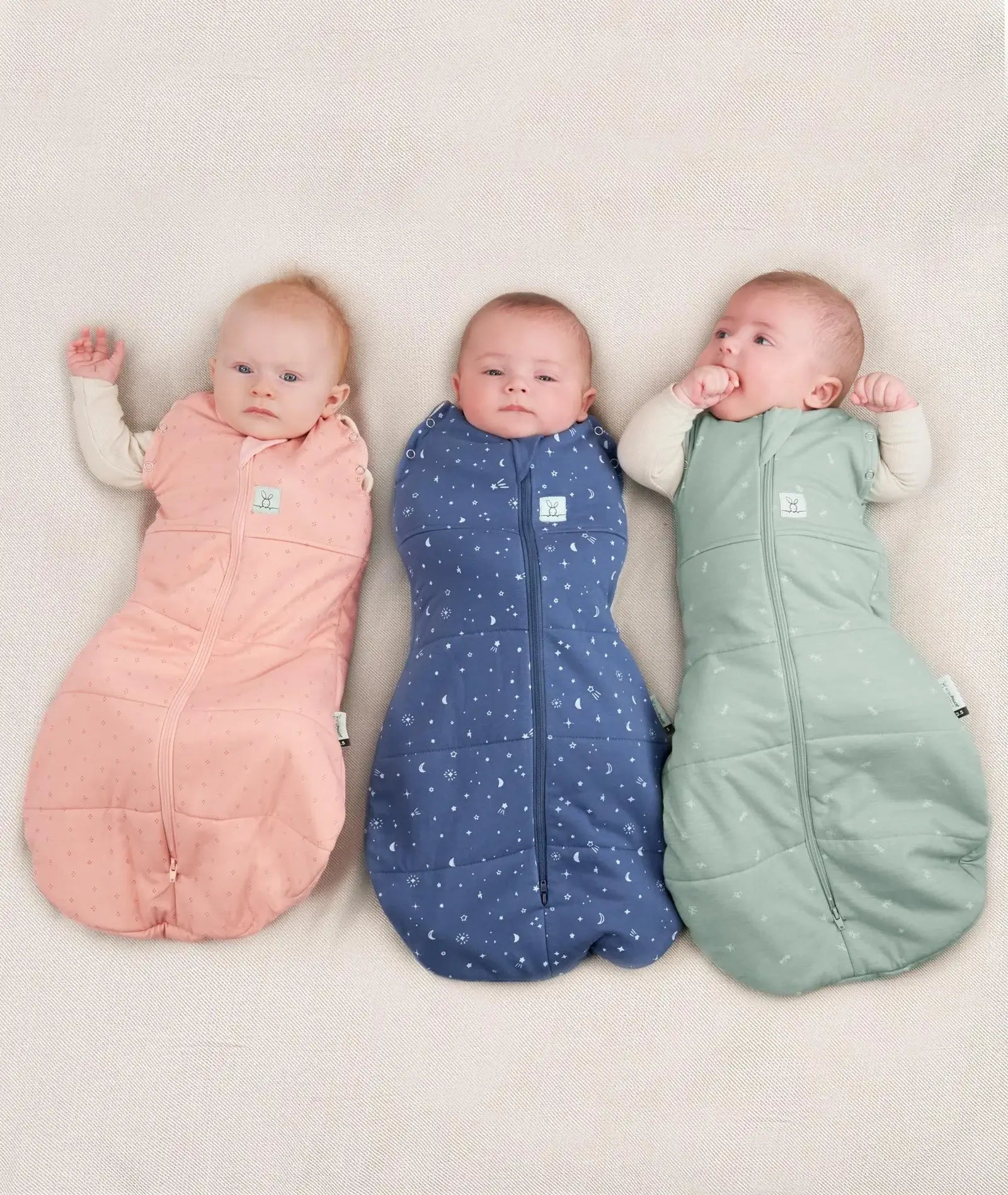 ergoPouch Cocoon Swaddle Bag 2.5 tog in sage — a secure, multifunctional infant sleep sack designed for newborns, featuring a zip-up swaddle-to-sleep transition, breathable natural fabric, and extra warmth for cooler nights.