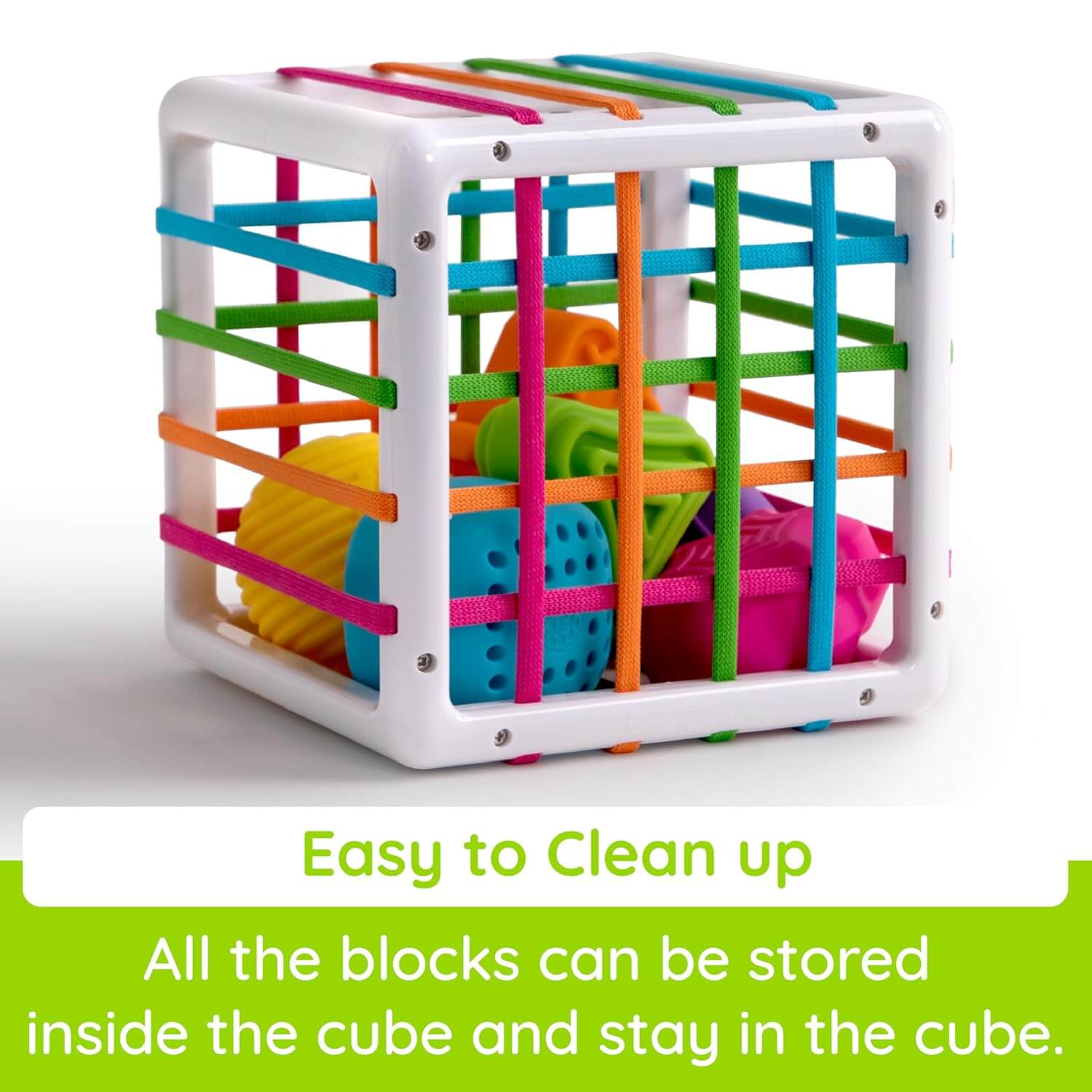 Fat Brain Toys InnyBin – sensory shape‑exploration cube with six chunky, textured blocks (cube, diamond, sphere, triangle, flower, logo) and elastic bands for frustration‑free fine motor play
