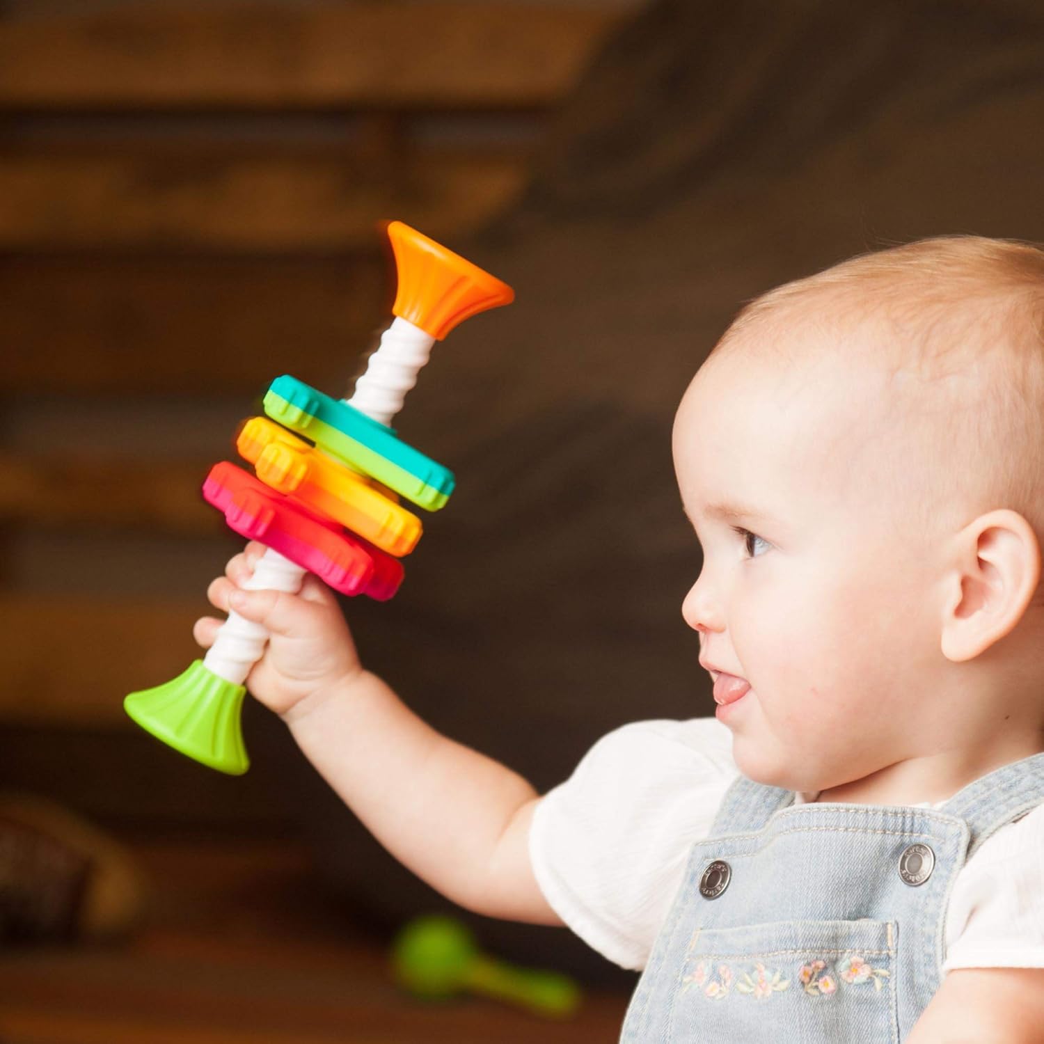 Fat Brain Toys MiniSpinny sensory propeller tower – three vibrant spectral-colour discs that spin down a corkscrew pole, designed to engage toddlers aged 10 months + in tactile play, early counting and colour recognition