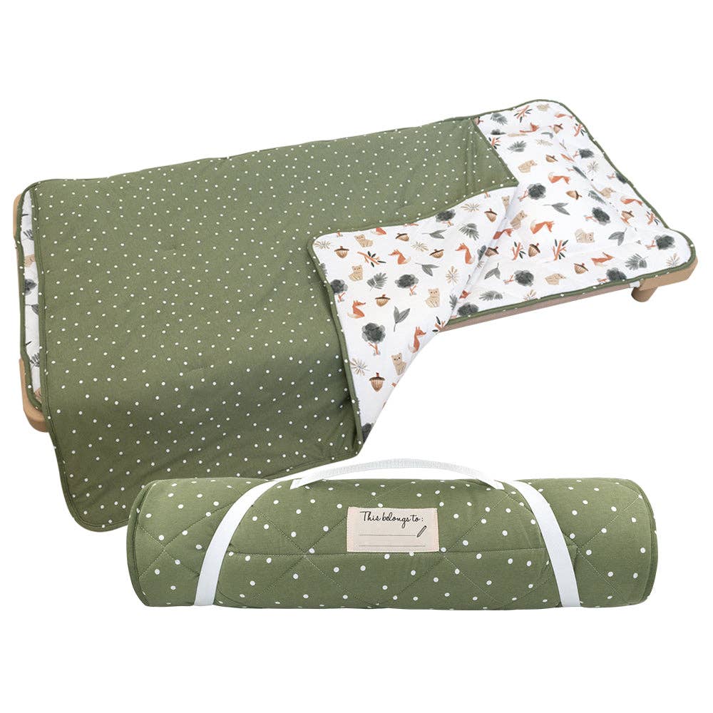 Living Textiles Deluxe Nap Mat – Forest Retreat design on sage‑tone organic cotton jersey with built‑in pillow and blanket, quilted base, four elastic loops for daycare stacker beds, carry handle and name label