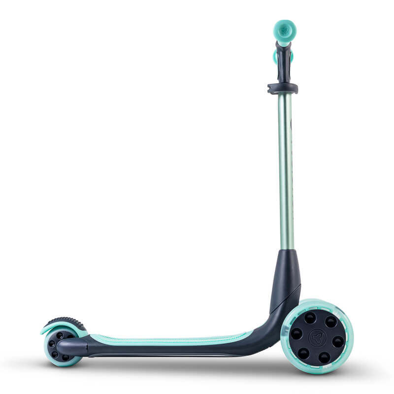 YGlider Nua green 2‑in‑1 foldable lean‑to‑steer scooter – lightweight kids’ scooter with adjustable arc‑folding handlebar, LED front wheels, wide rear wheel and wall‑mount accessory