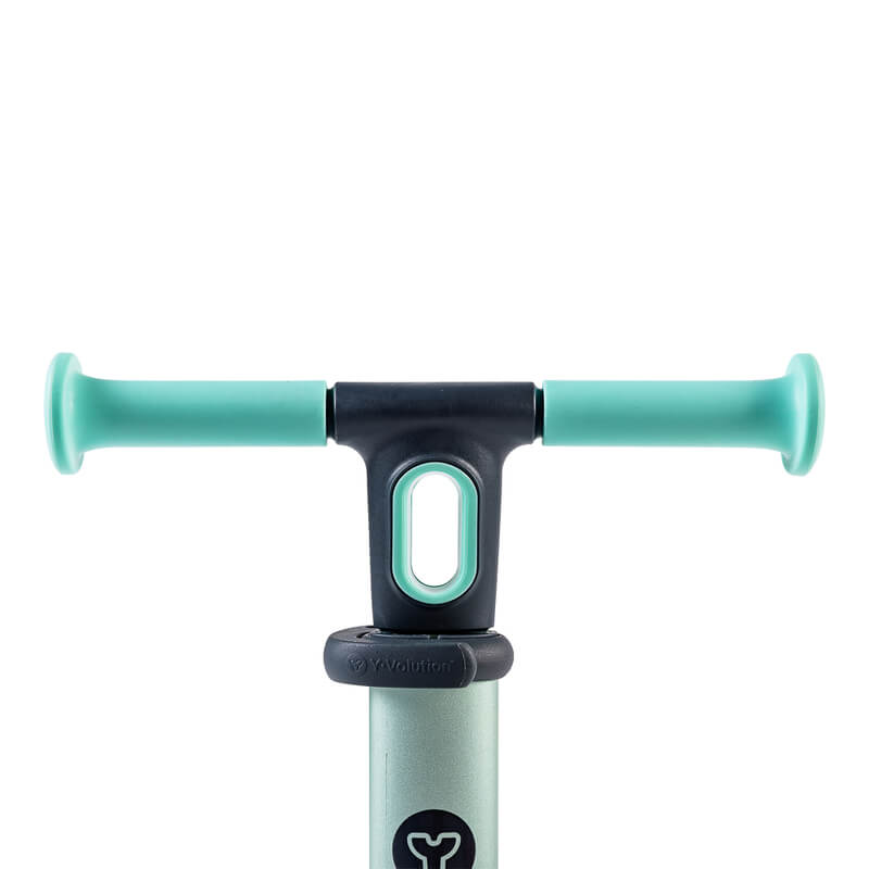 YGlider Nua green 2‑in‑1 foldable lean‑to‑steer scooter – lightweight kids’ scooter with adjustable arc‑folding handlebar, LED front wheels, wide rear wheel and wall‑mount accessory