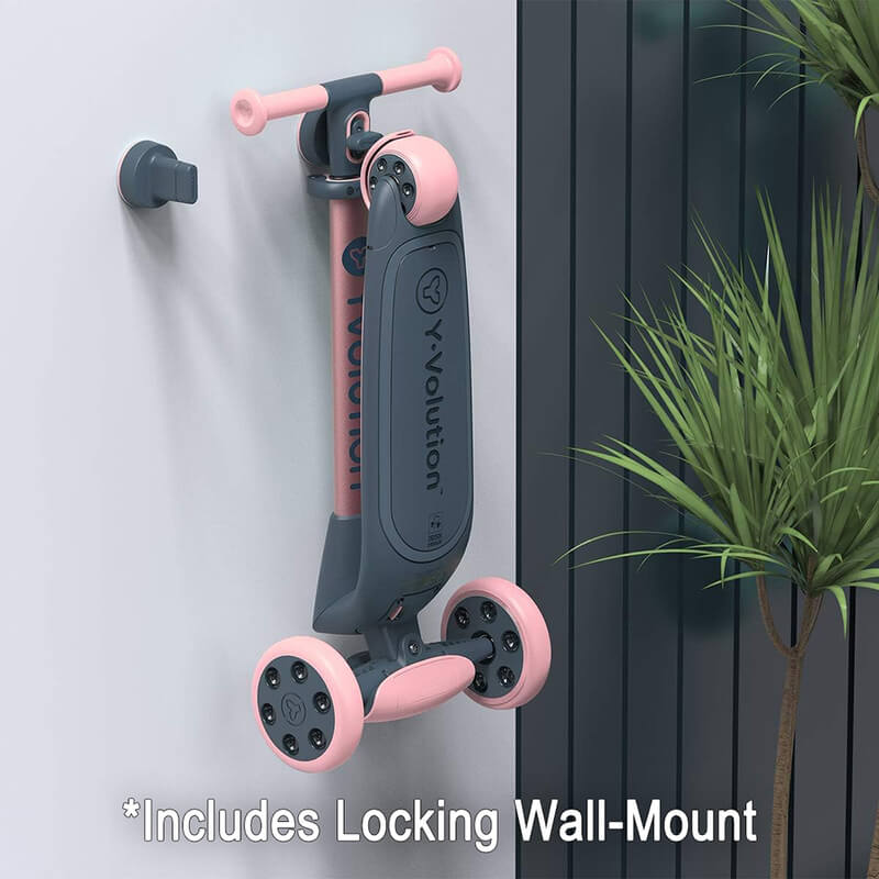 YGlider Nua pink 2‑in‑1 foldable lean‑to‑steer scooter – lightweight kids’ scooter with adjustable arc‑folding handlebar, LED front wheels, wide rear wheel and wall‑mount accessory