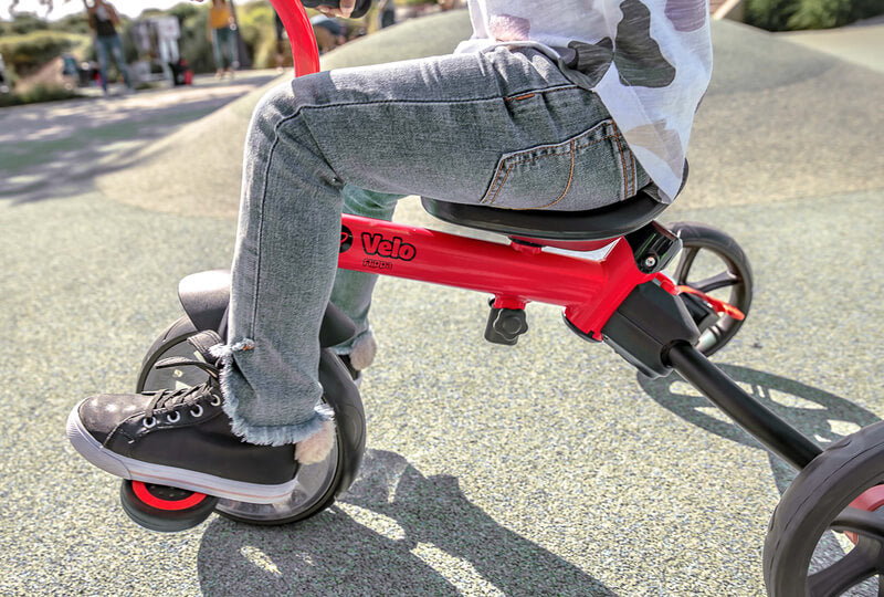Velo Flippa red trike – 4-in-1 convertible toddler ride-on with removable push handle, wide seat, sturdy frame and non-slip footrests