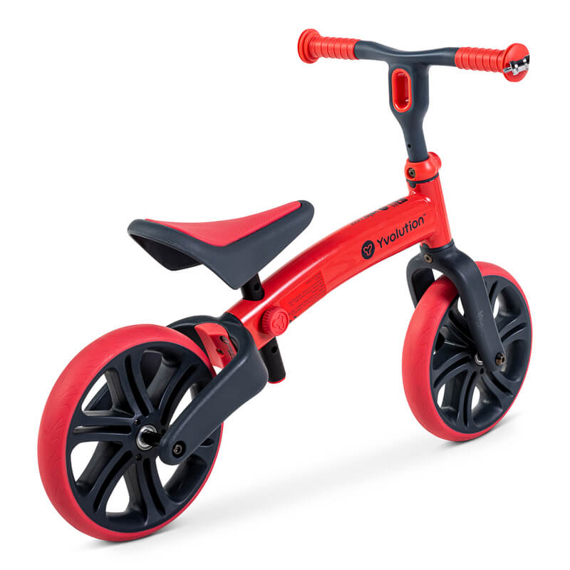 Velo Junior red balance bike for toddlers – two‑stage no‑pedal training bike with dual rear wheels, adjustable seat and handlebars, lightweight aluminum frame and puncture‑proof wheels