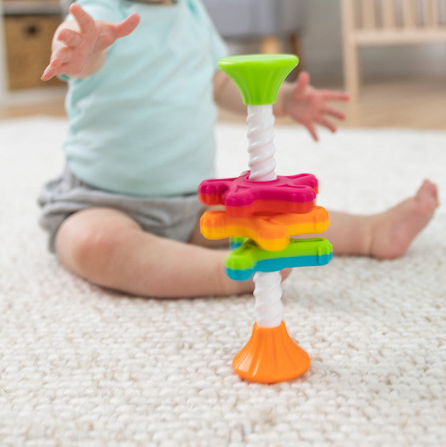 Fat Brain Toys MiniSpinny sensory propeller tower – three vibrant spectral-colour discs that spin down a corkscrew pole, designed to engage toddlers aged 10 months + in tactile play, early counting and colour recognition
