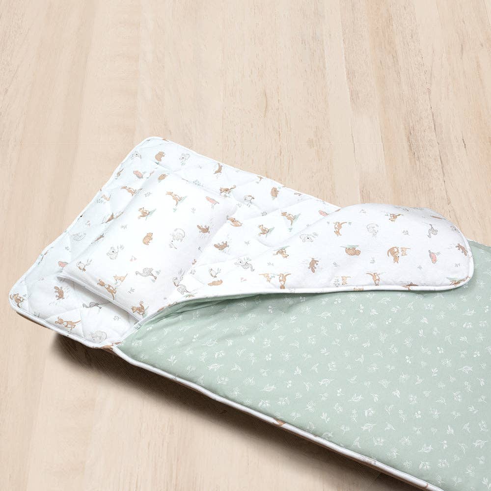 Living Textiles Deluxe Nap Mat – Australiana design on sage‑tone organic cotton jersey with built‑in pillow and blanket, quilted base, four elastic loops for daycare stacker beds, carry handle and name label