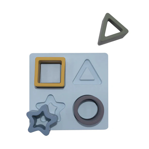 Living Textiles Silicone Shape Puzzle in steel blue – BPA‑free food‑grade silicone blocks in various geometric shapes that interlock and squeak, promoting fine motor skills, sensory play and hand‑eye coordination for babies aged 6 months+