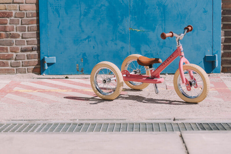 Steel Pink Vintage 3‑Wheel Trybike – retro-style toddler bike in cream & pink with low step-through frame, wide cushioned seat, high-back support, and smooth-ride wheels