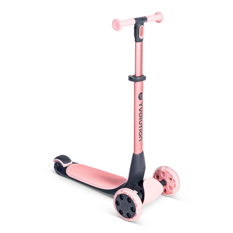YGlider Nua pink 2‑in‑1 foldable lean‑to‑steer scooter – lightweight kids’ scooter with adjustable arc‑folding handlebar, LED front wheels, wide rear wheel and wall‑mount accessory
