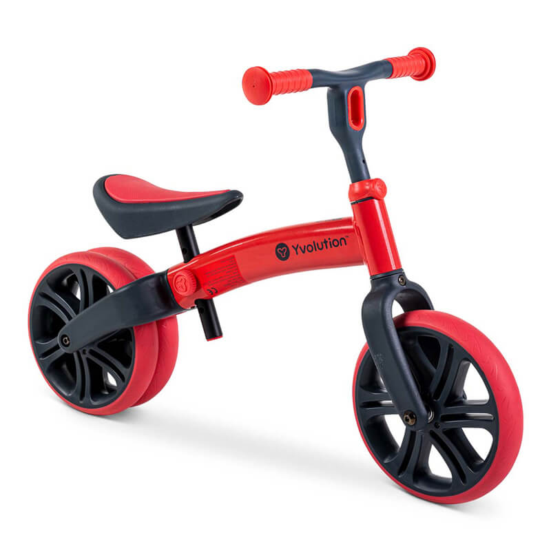 Velo Junior red balance bike for toddlers – two‑stage no‑pedal training bike with dual rear wheels, adjustable seat and handlebars, lightweight aluminum frame and puncture‑proof wheels