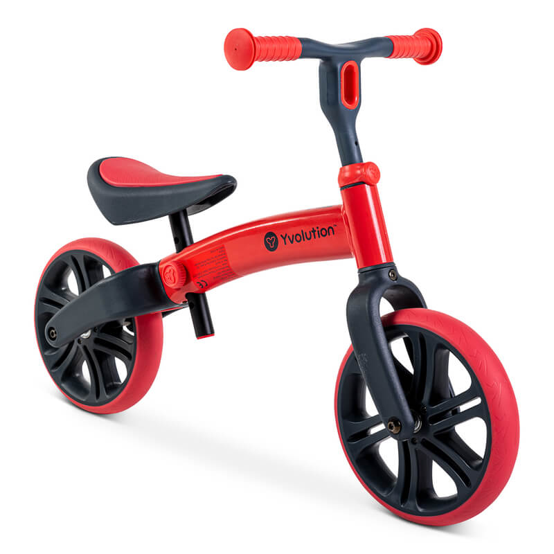 Velo Junior red balance bike for toddlers – two‑stage no‑pedal training bike with dual rear wheels, adjustable seat and handlebars, lightweight aluminum frame and puncture‑proof wheels