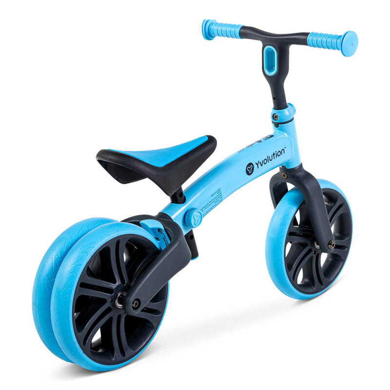 Velo Junior blue balance bike for toddlers – two‑stage no‑pedal training bike with dual rear wheels, adjustable seat and handlebars, lightweight aluminum frame and puncture‑proof wheels